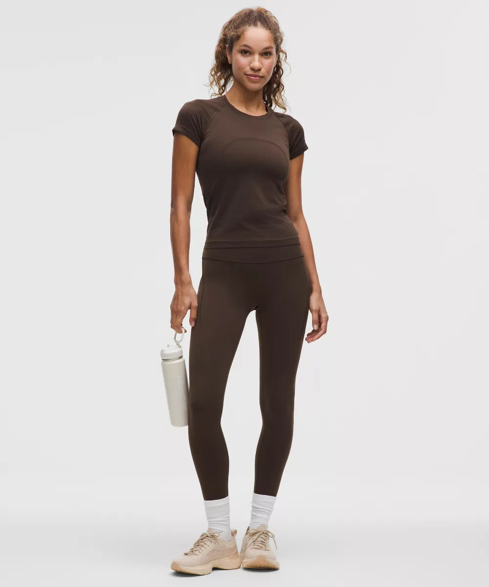 Legging Wunder Train taille haute avec poches 64 cm