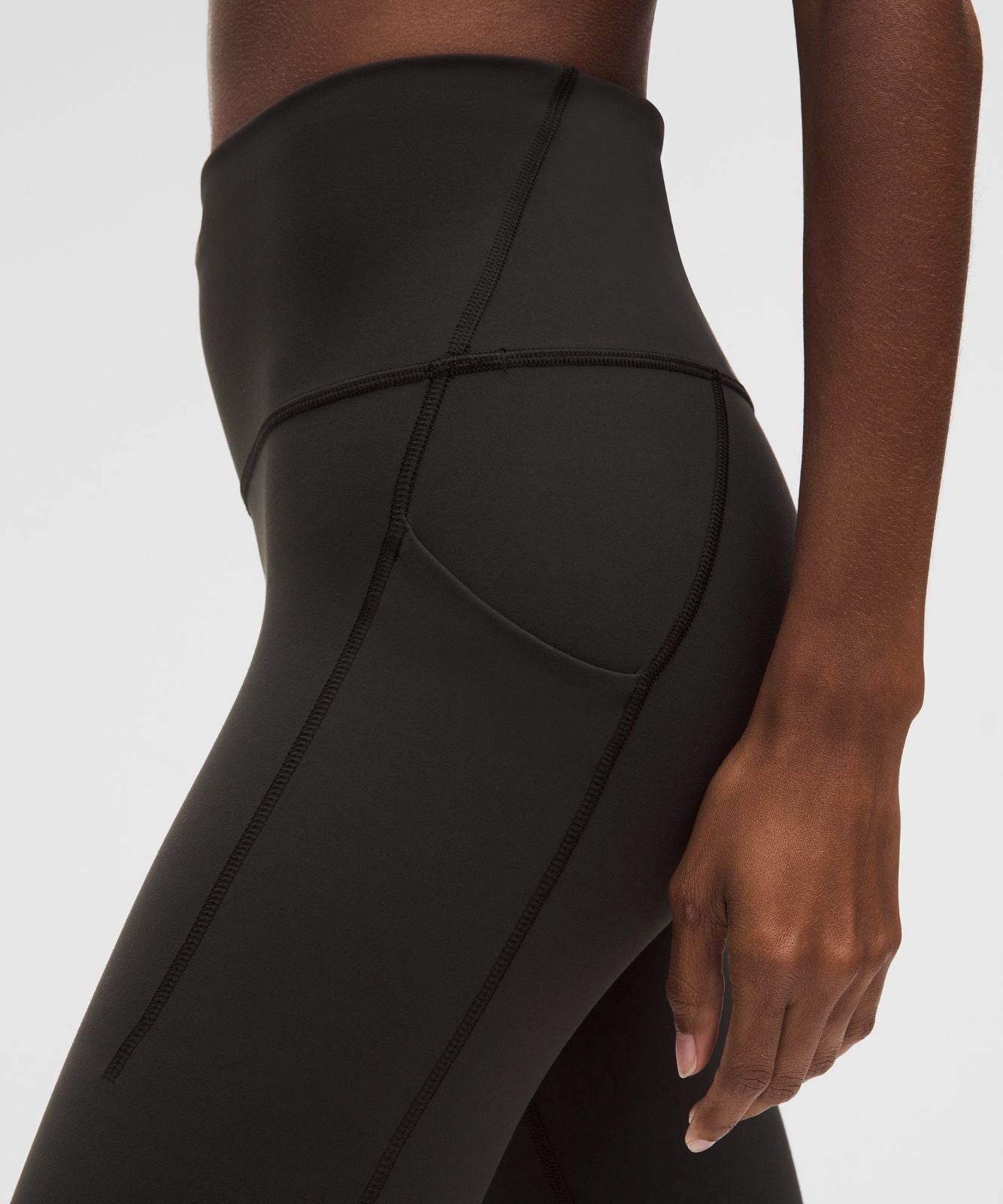 Legging Wunder Train taille haute avec poches 64 cm