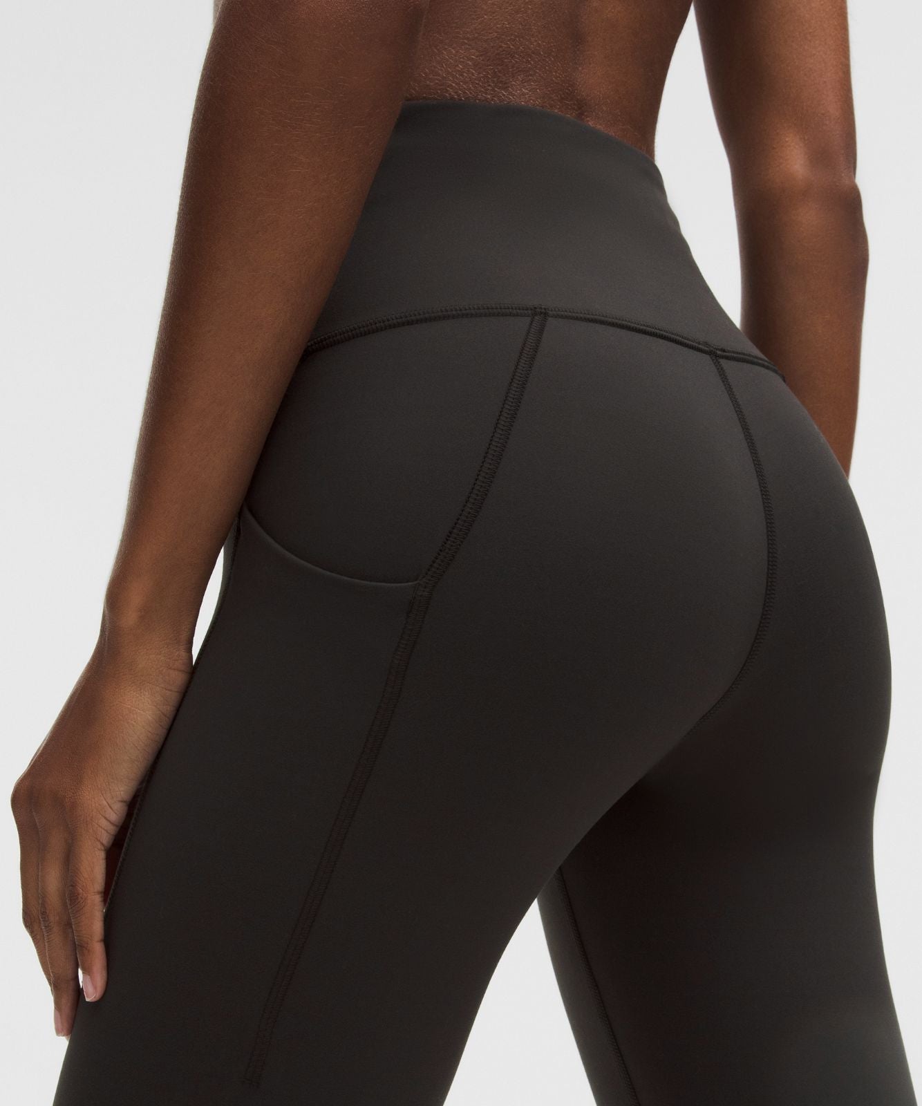 Legging Wunder Train taille haute avec poches 64 cm