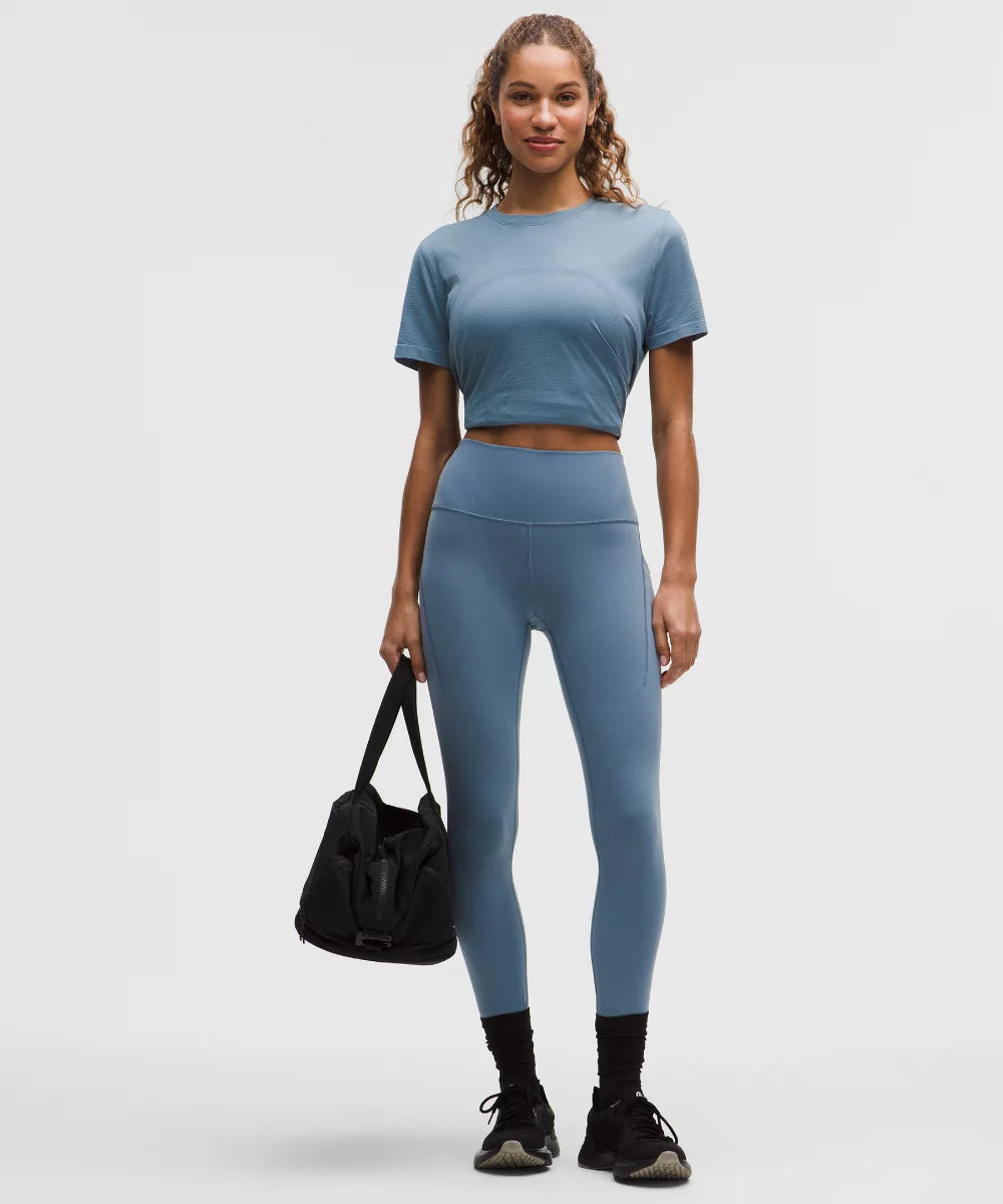 Legging Wunder Train taille haute avec poches 64 cm